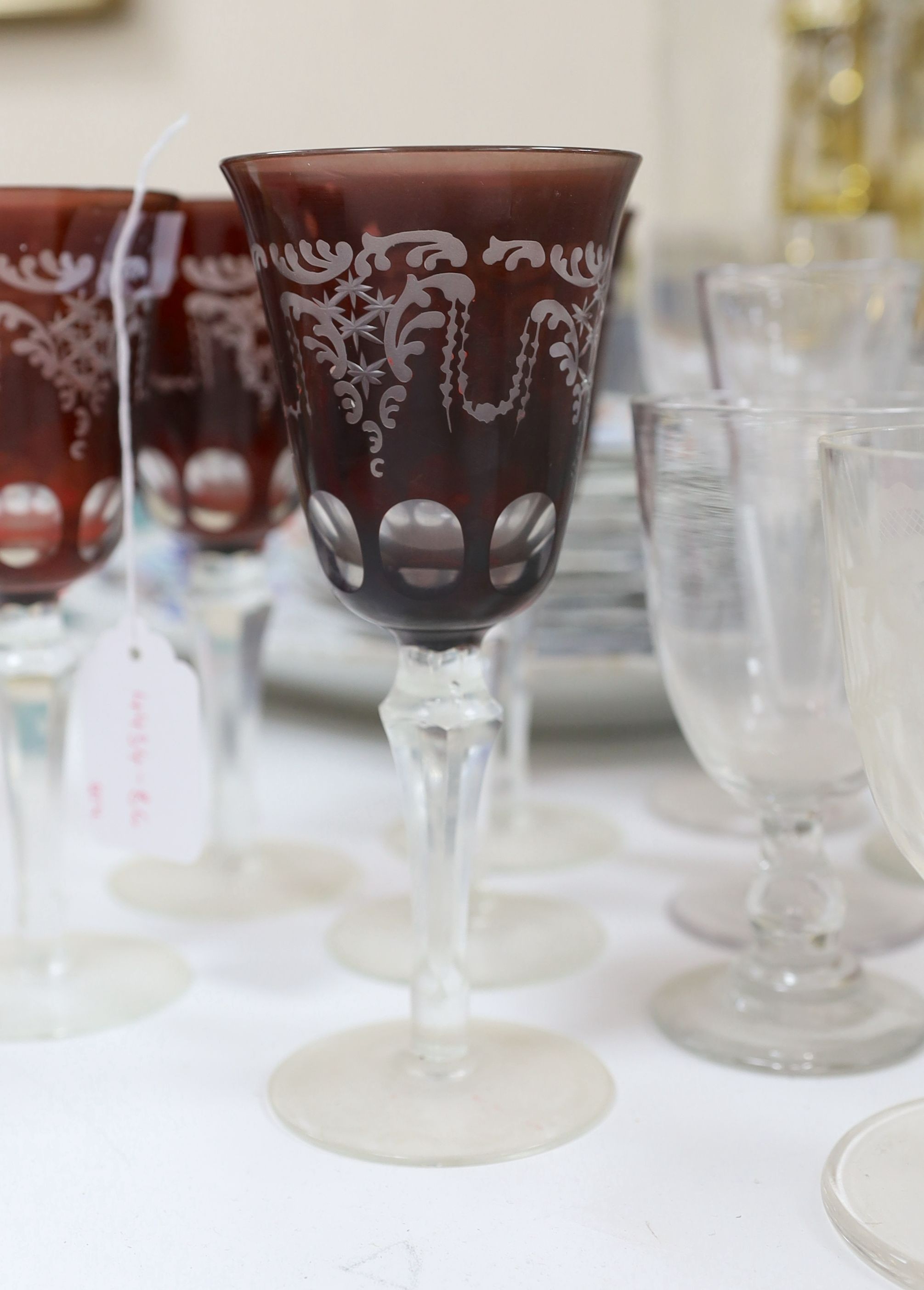 A collection of mostly 19th century rummers and ruby etched glass wine glasses, flutes etc.